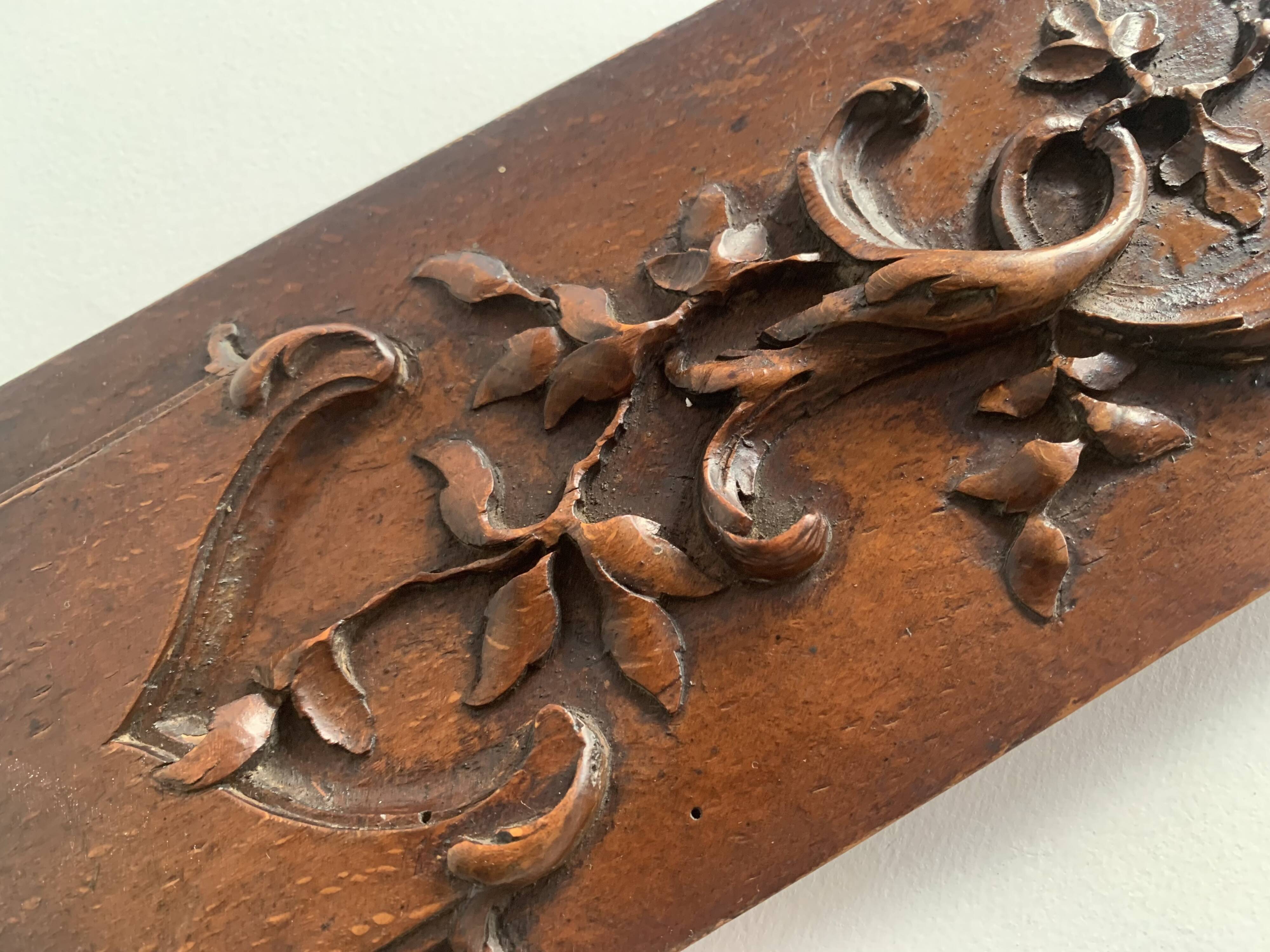 Small 19th century carved wooden wall panel