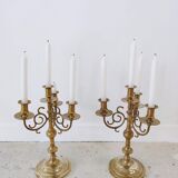 Pair of four-light candle holders in gilded brass