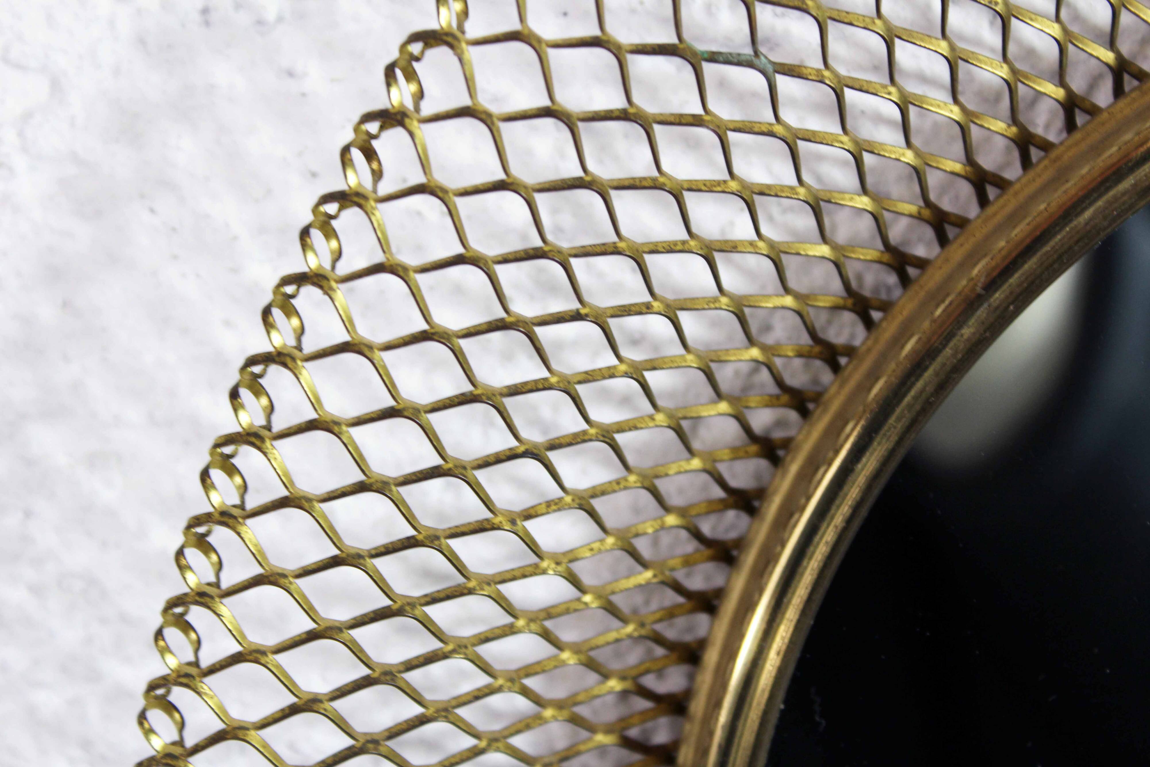 Round gold metal mirror