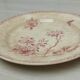 Plat rond en terre de fer de Gien modèle Aubépine rose