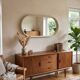 Oval mirror in white lacquer from the 1970s.