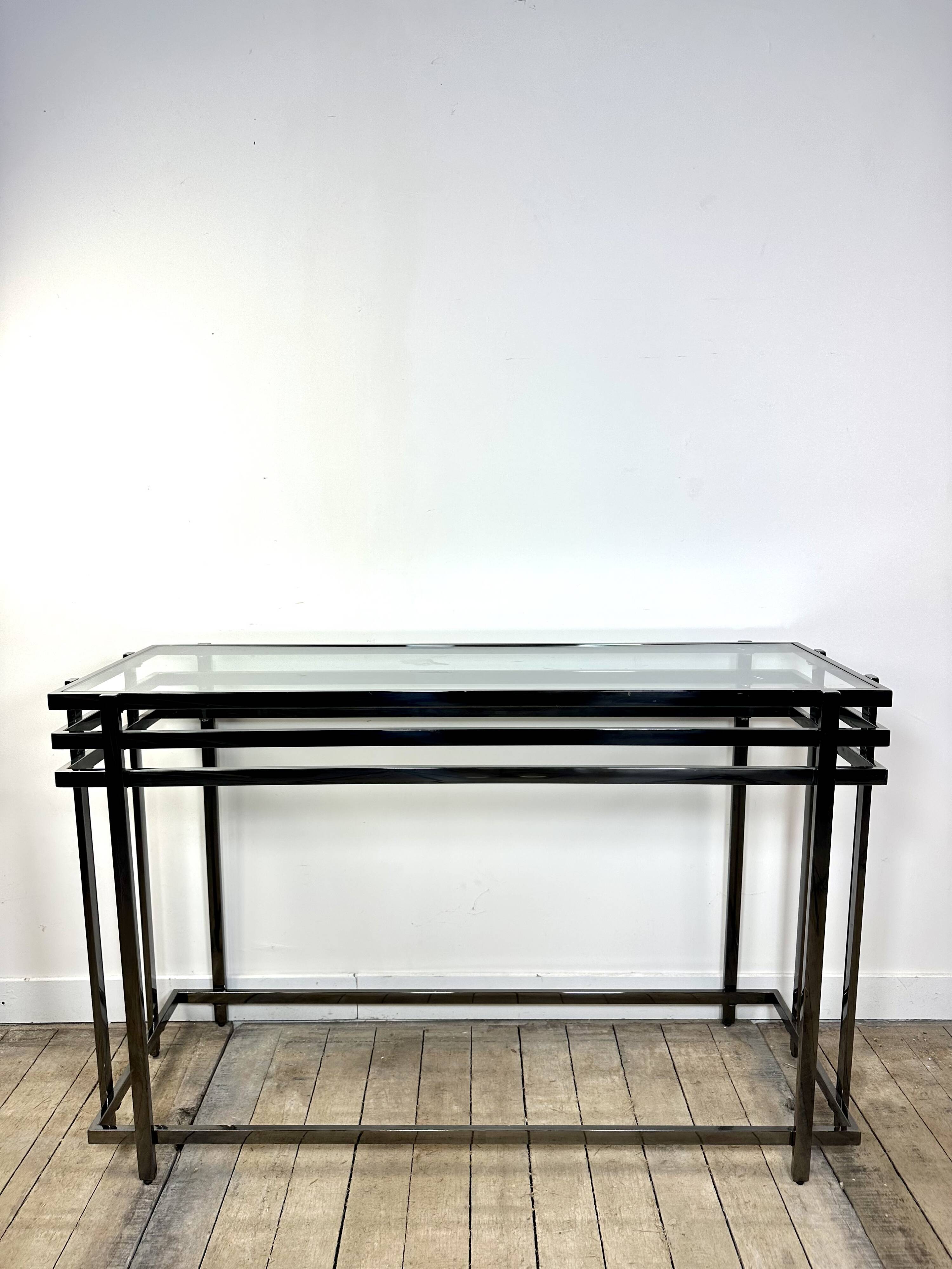 Smoked silver metal console from the 2000s.