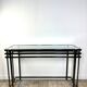 Smoked silver metal console from the 2000s.