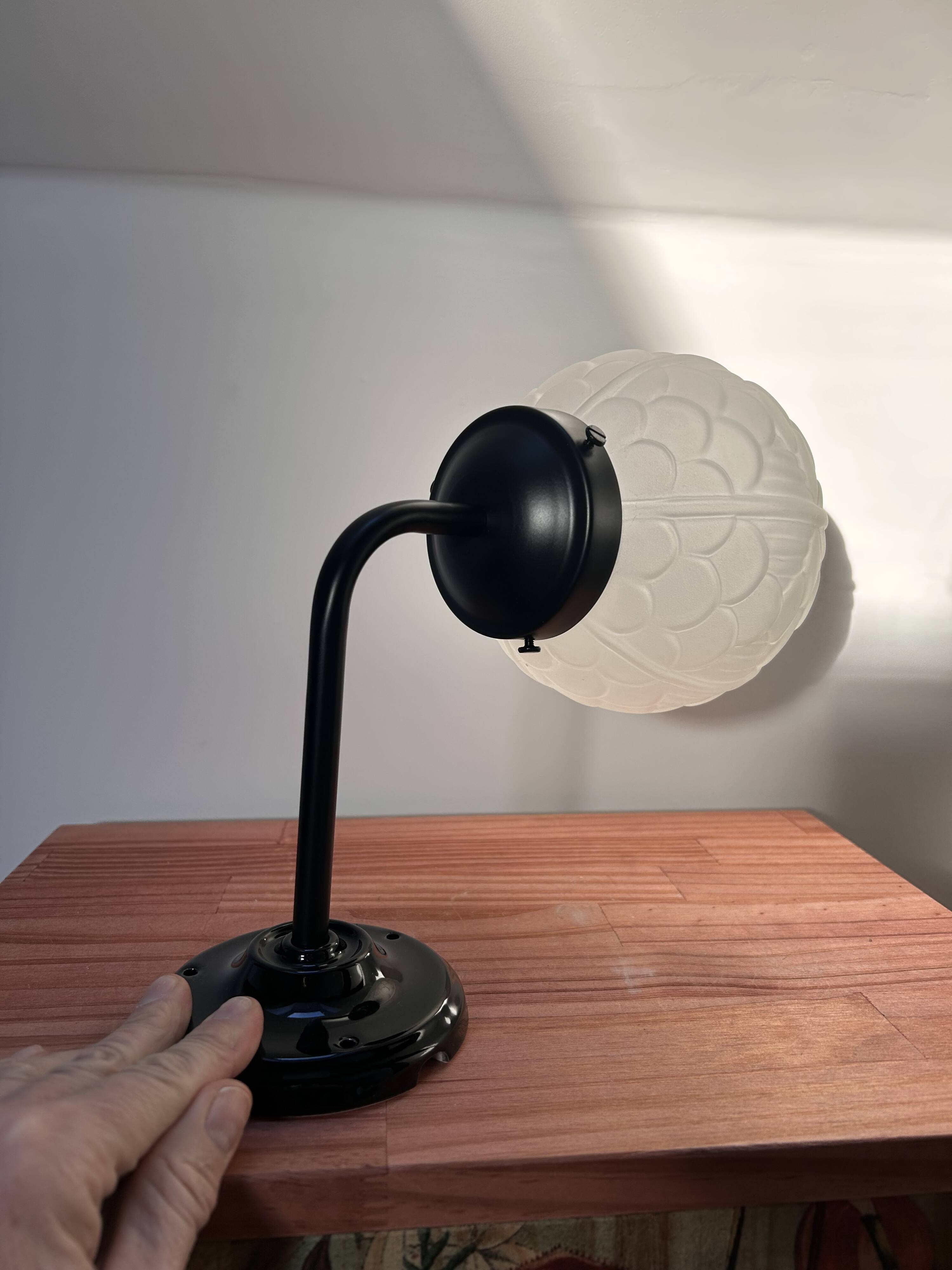 Black art deco wall light