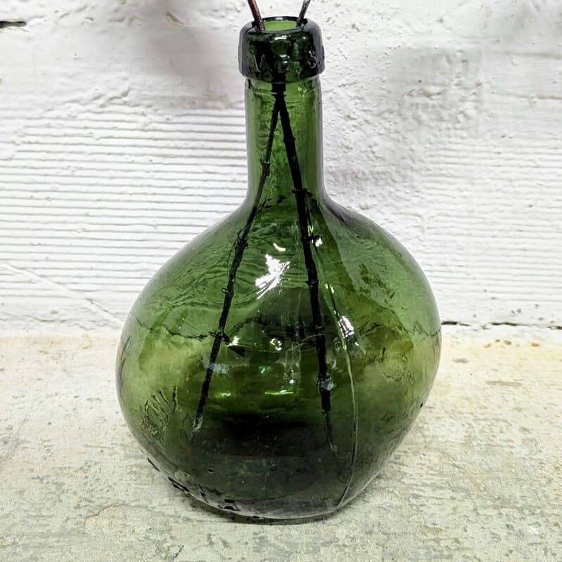 Oval green demijohn