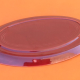 Oval serving dish burgundy-coloured glazed ceramic