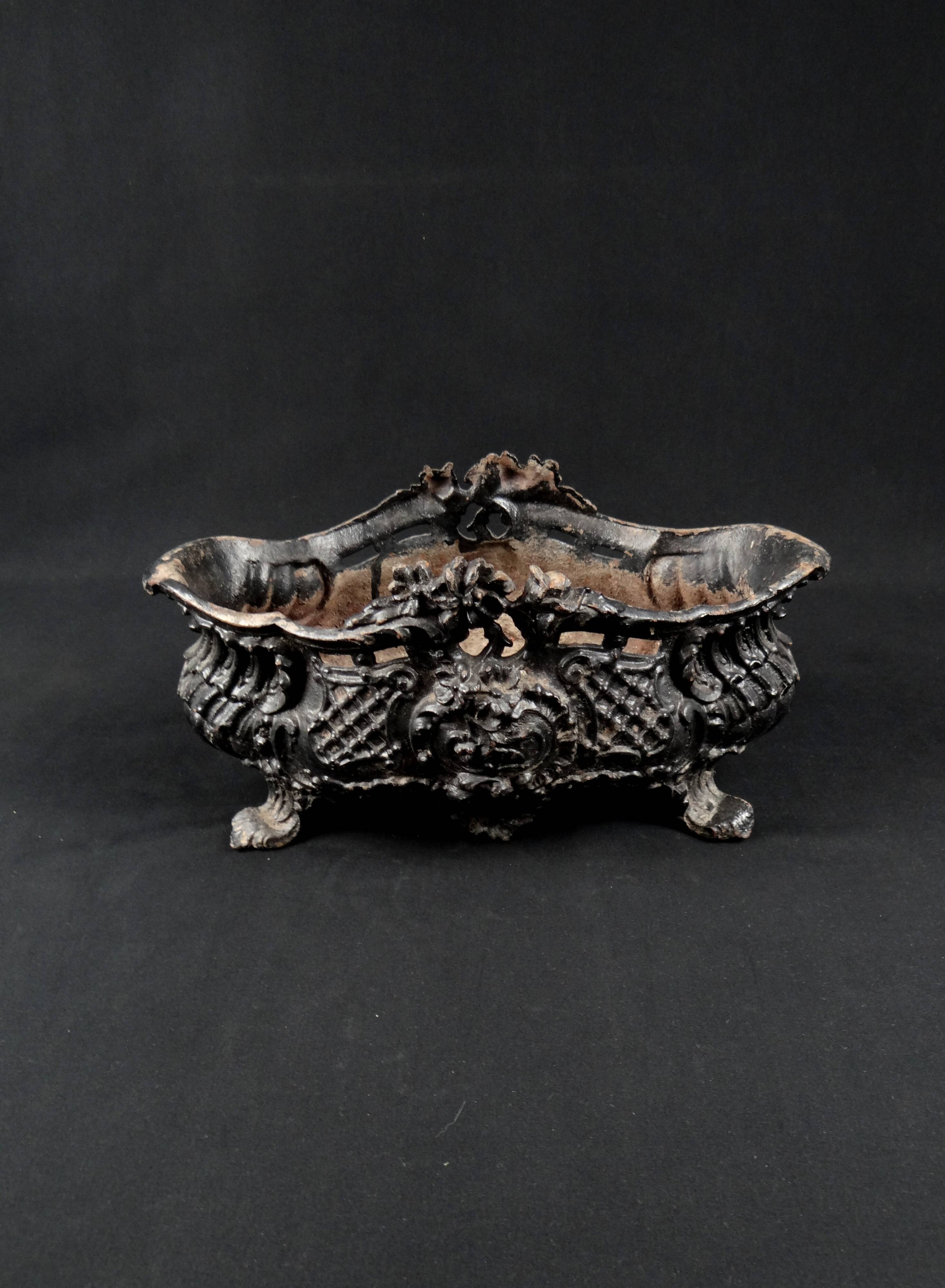 Antique black cast iron planter from the late 19th century Rocaille style