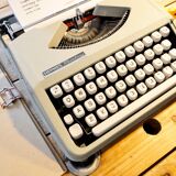 Blue green baby hermes typewriter