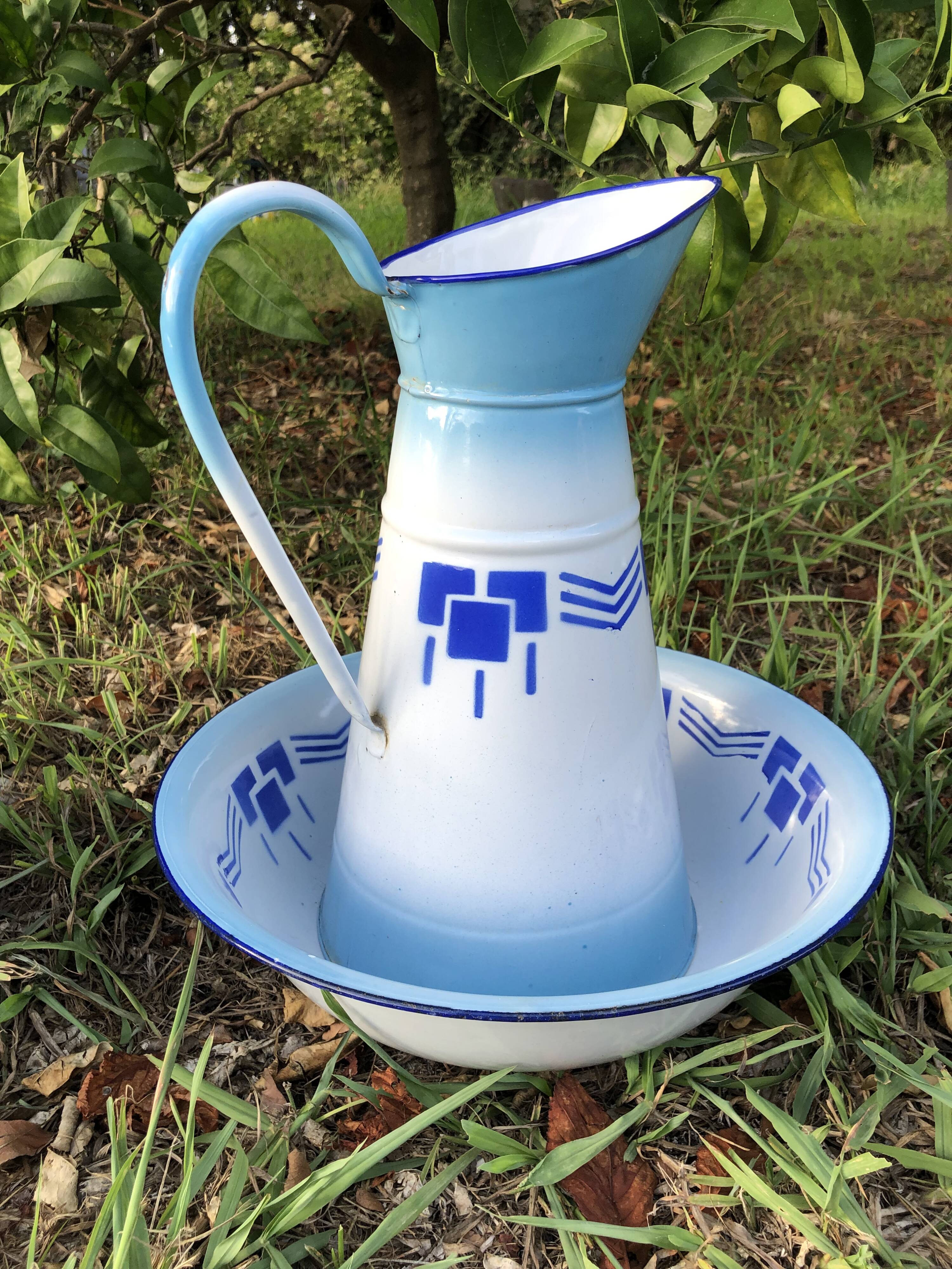 Enamelled jug, bowl and bucket