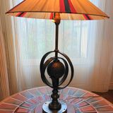 Wrought iron lamp with armillary sphere decorations