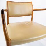 Pair of N.O. Moeller armchairs, model 65, in rosewood and light leather