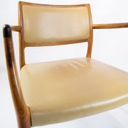 Pair of N.O. Moeller armchairs, model 65, in rosewood and light leather