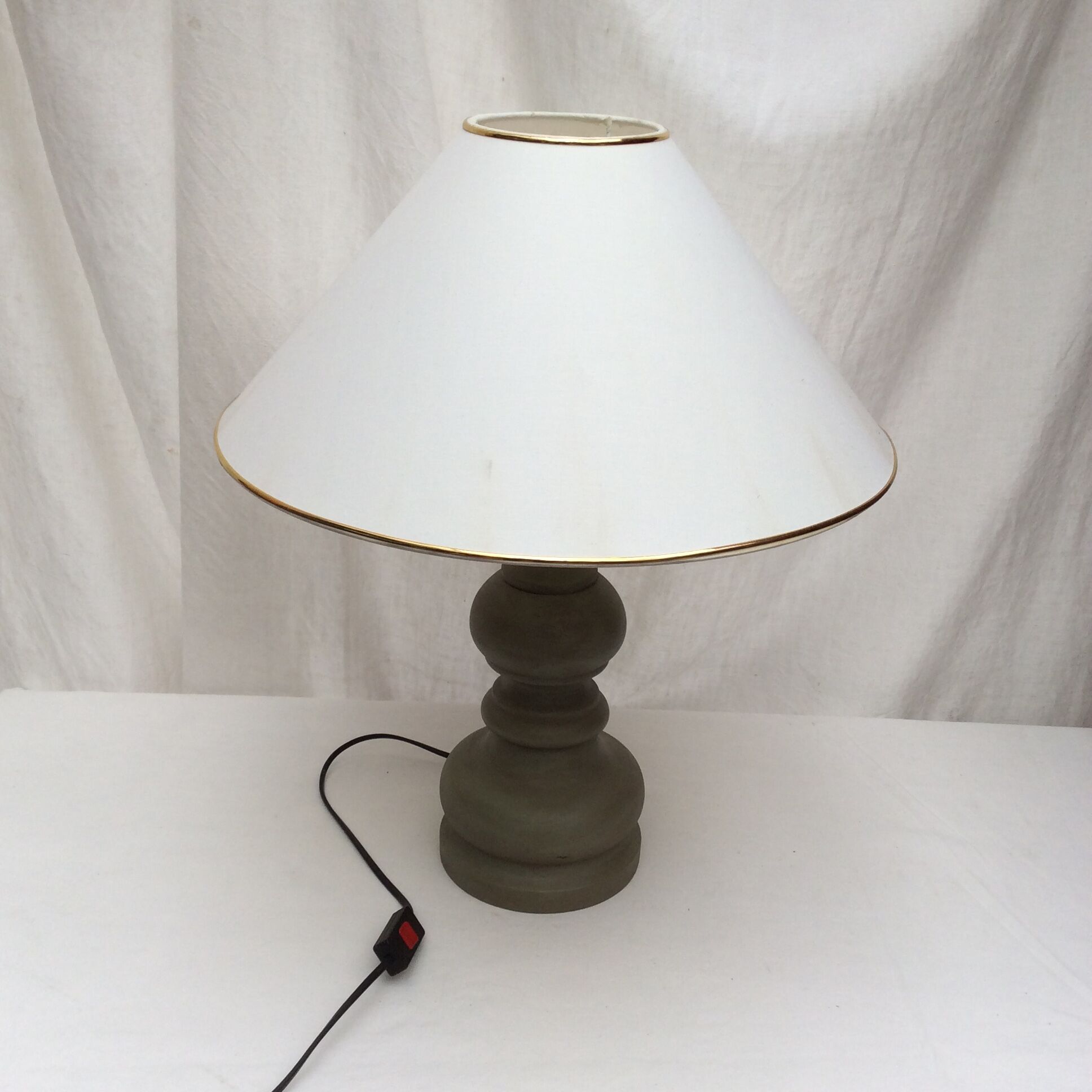 Wooden table lamp in light green color with lampshade
