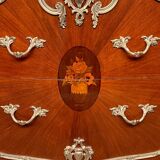 Louis XV style commode. Marquetry, gilded bronze decoration.