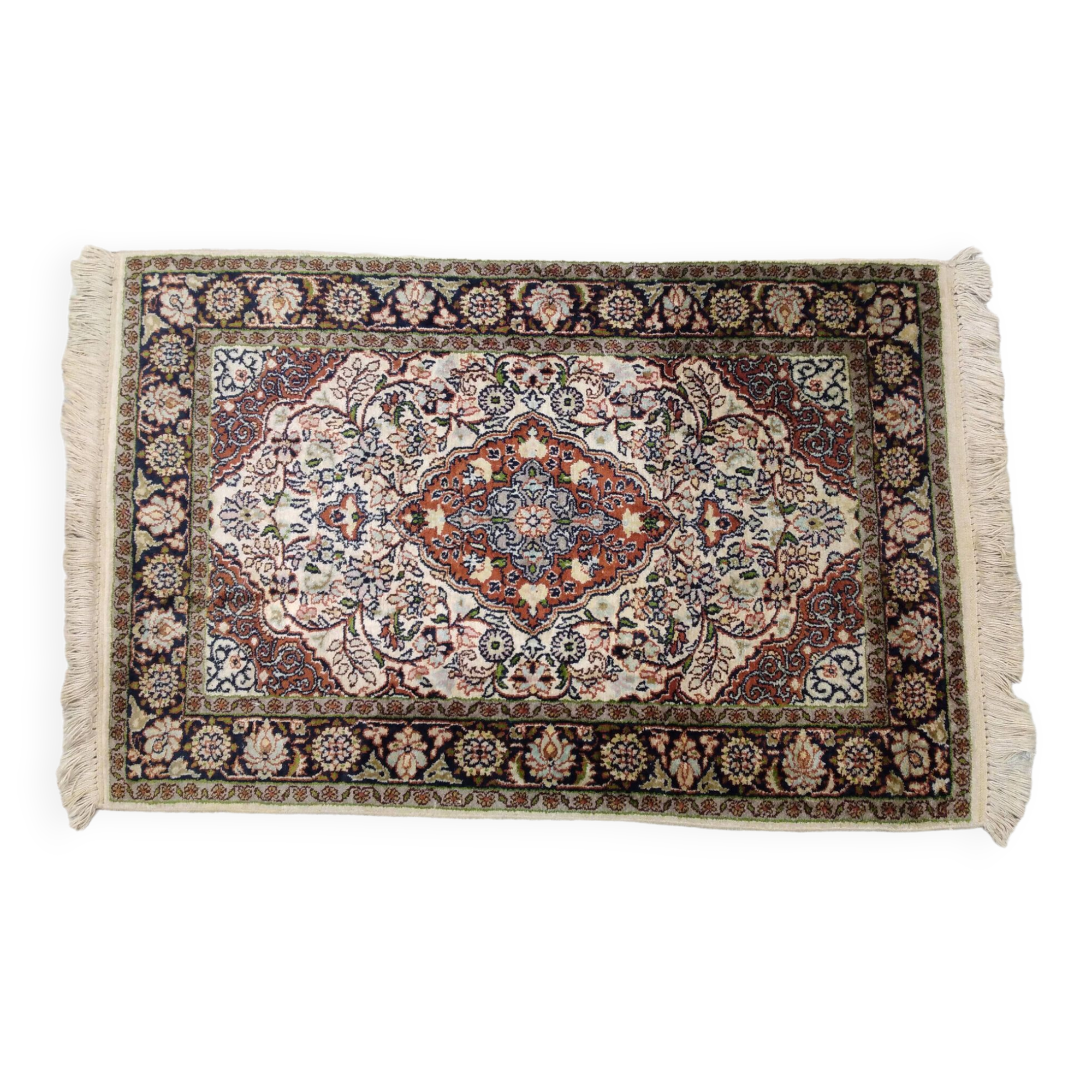 Handmade Persian wool and silk rug