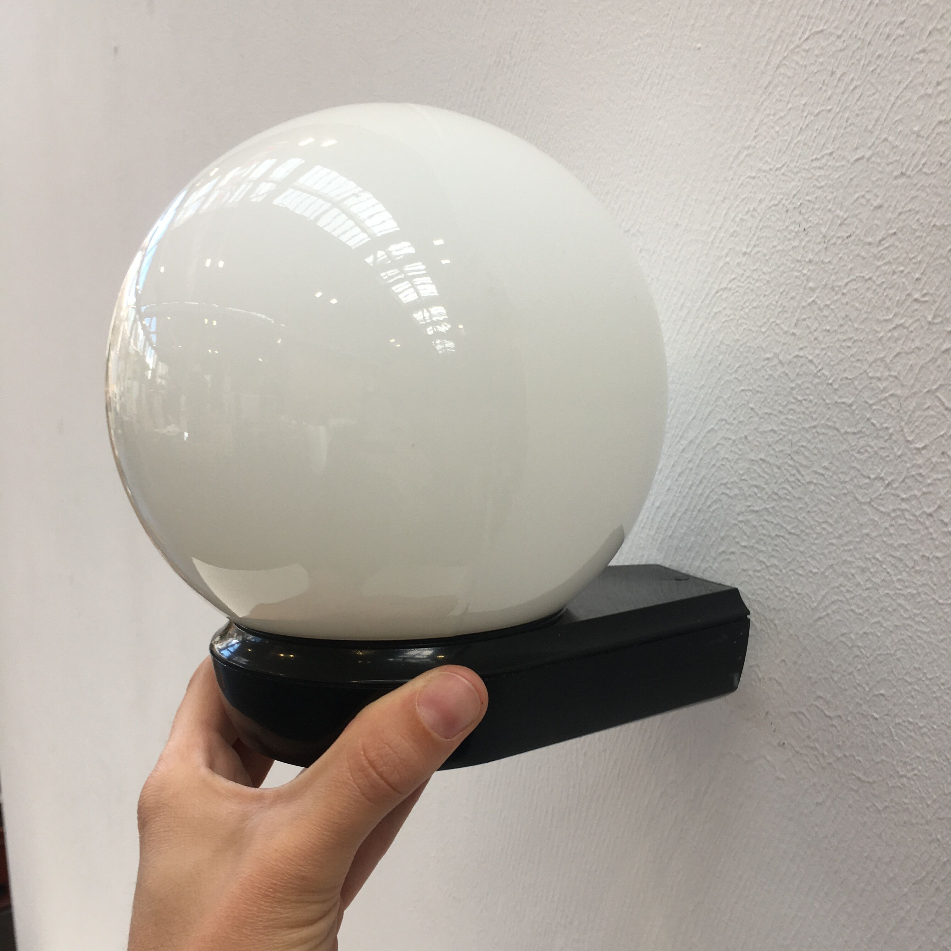 Vintage wall lamp black plastic base and opaline globe