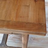 Elm farmhouse table with extensions for 6 to 10 people.