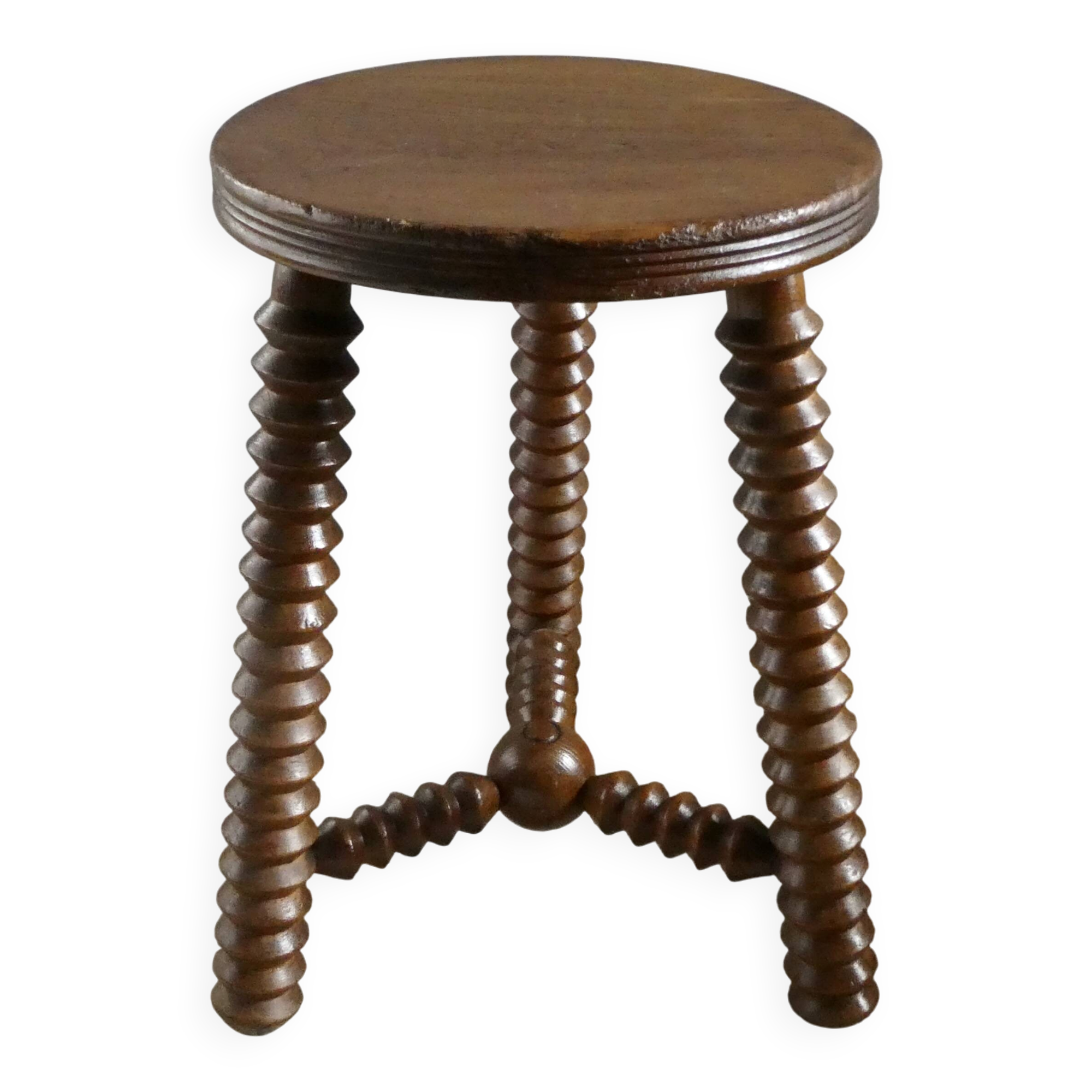 Tripod stool, with carved legs, around 1940