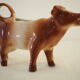 Milk jar in the shape of a vintage ceramic cow