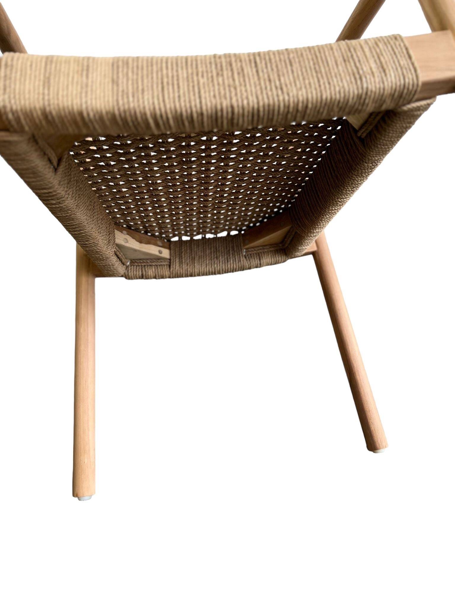 Solid wood chair with woven seat and armrests