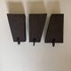 Graphical black stoneware ceramic wall light with handmade ring.