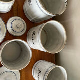 Série de 6 pots à épice en tôle émaillée