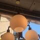 Lustre boomerang scandinave en teck  3 globes en opaline