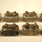 8 silver and gold napkin rings