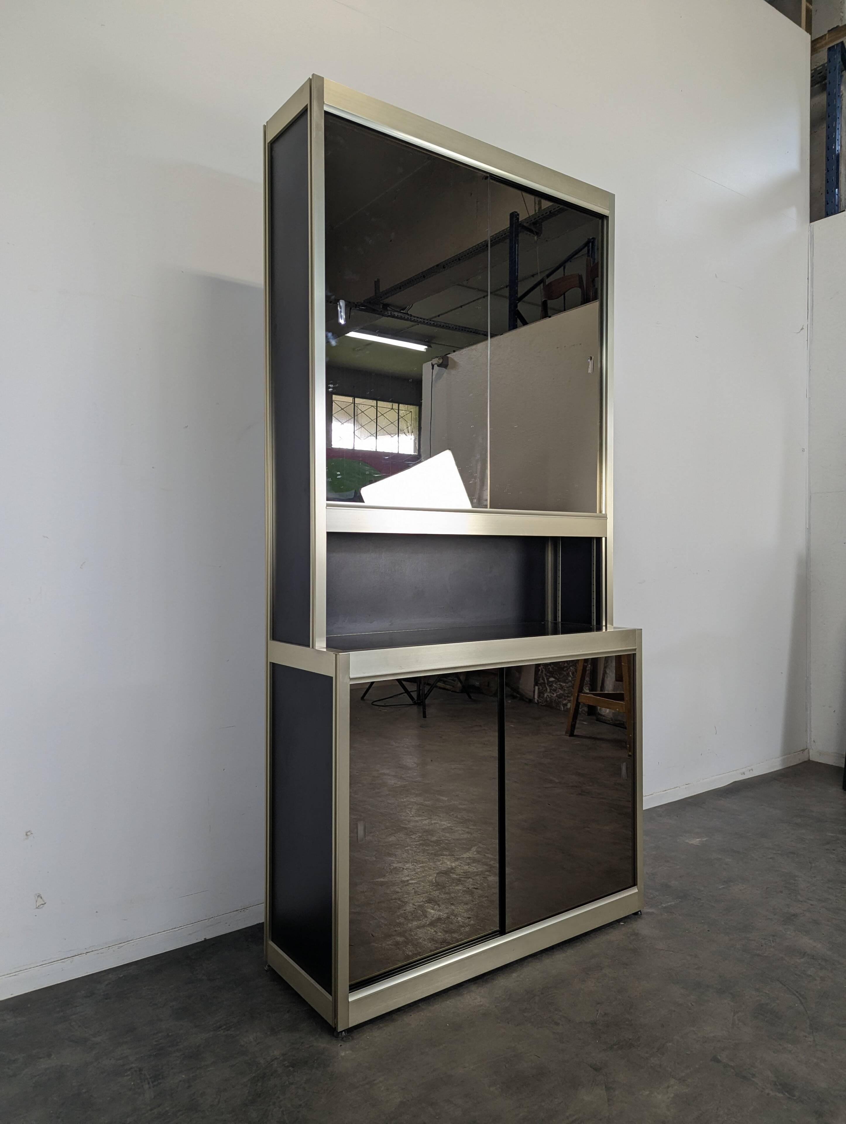 Vintage aluminium and glass display cabinet from the 1980s.