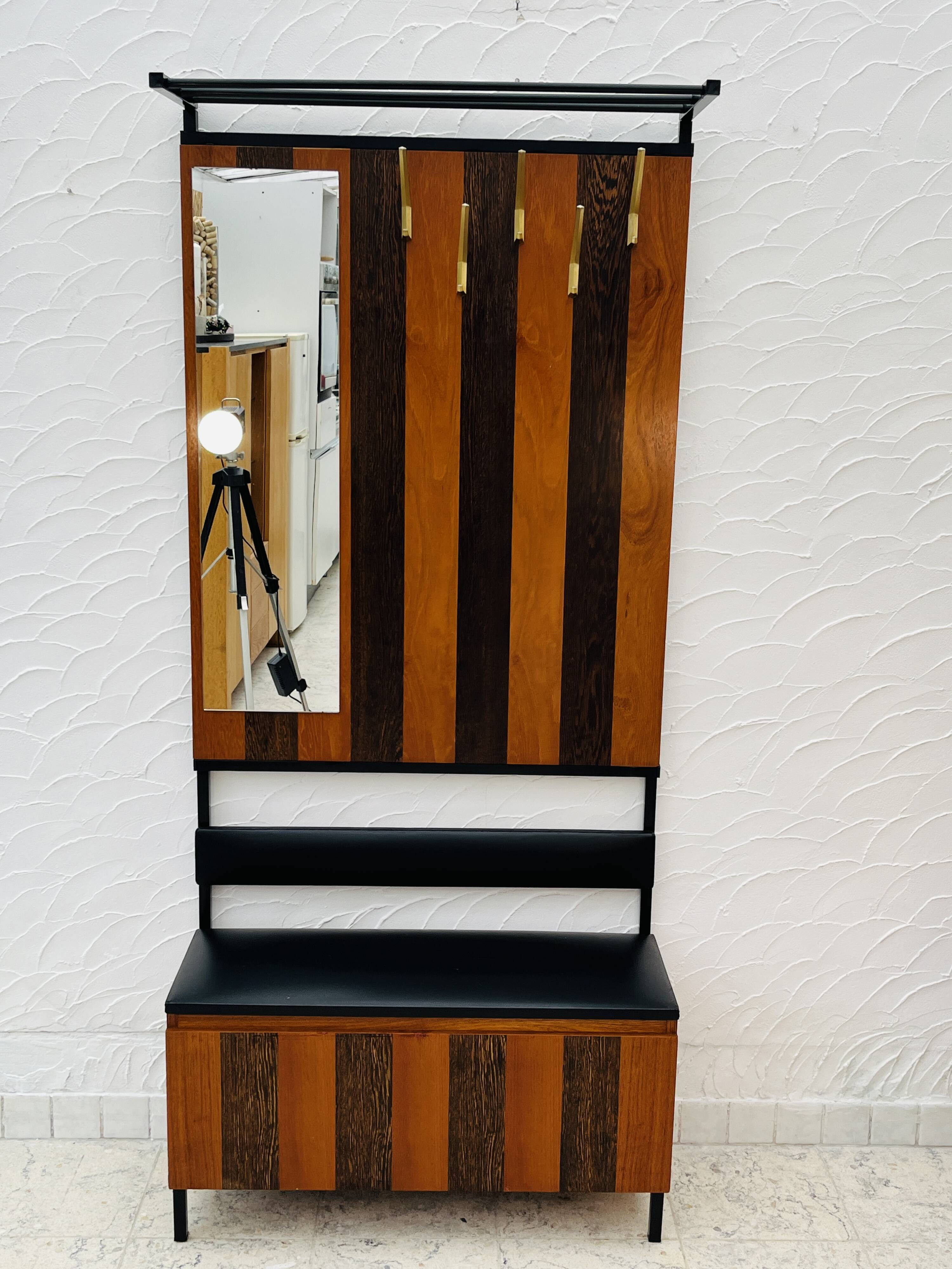 Vintage wall coat rack with storage bench from the 1970s.