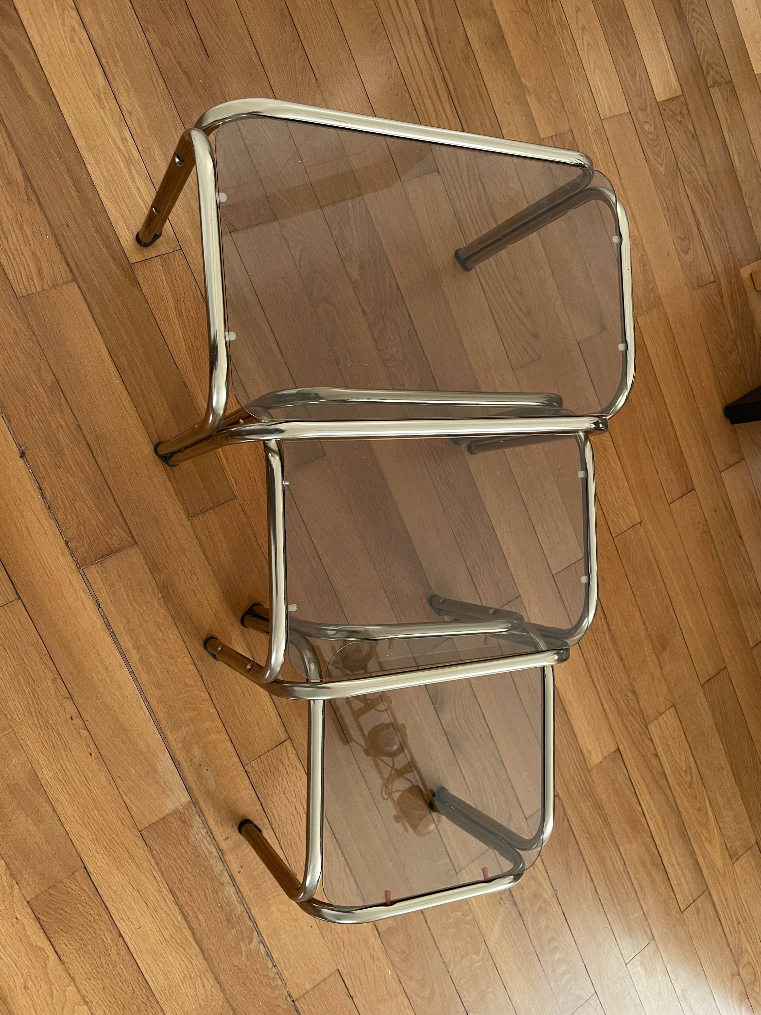 Pull-out tables in vintage smoked glass