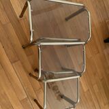 Pull-out tables in vintage smoked glass