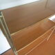 Étagère en bois et formica string doré
