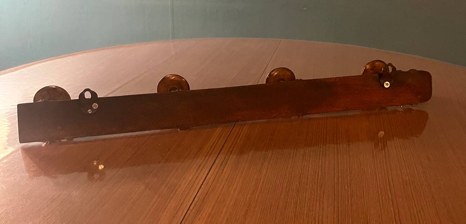 Old wooden wall coat rack