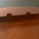 Old wooden wall coat rack