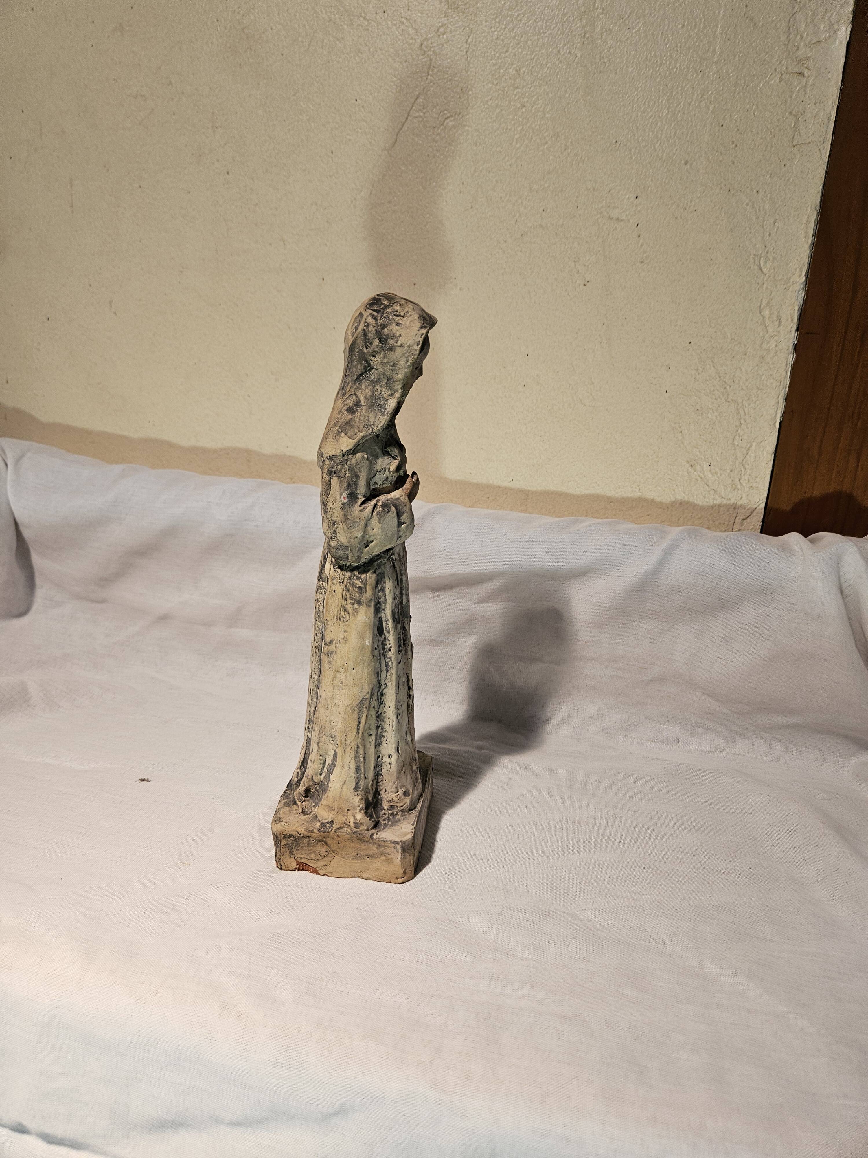 Painted terracotta holy virgin statue