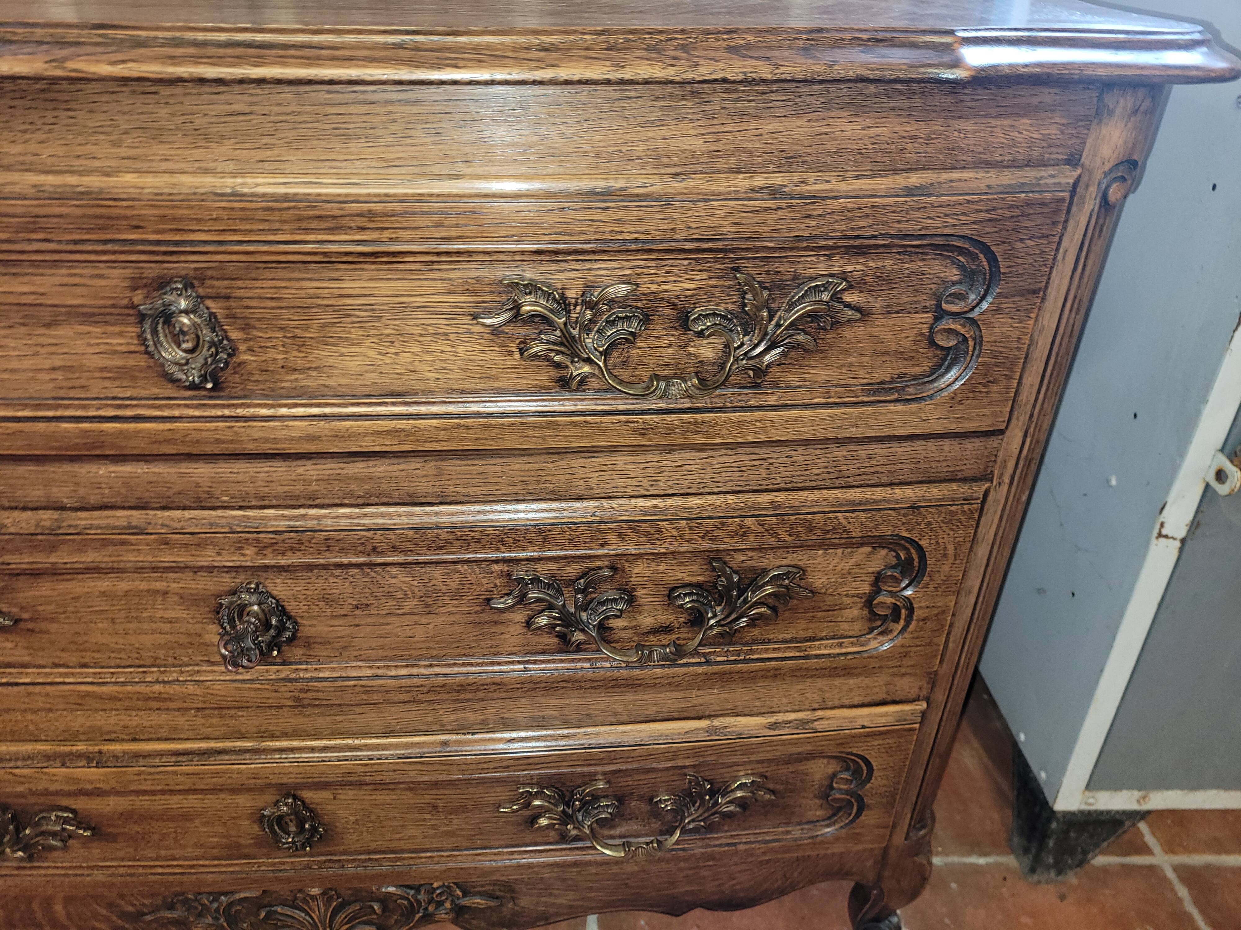 Louis XV style chest of drawers in solid oak
