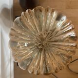 Table lamp with a gold-trimmed globe and a black base
