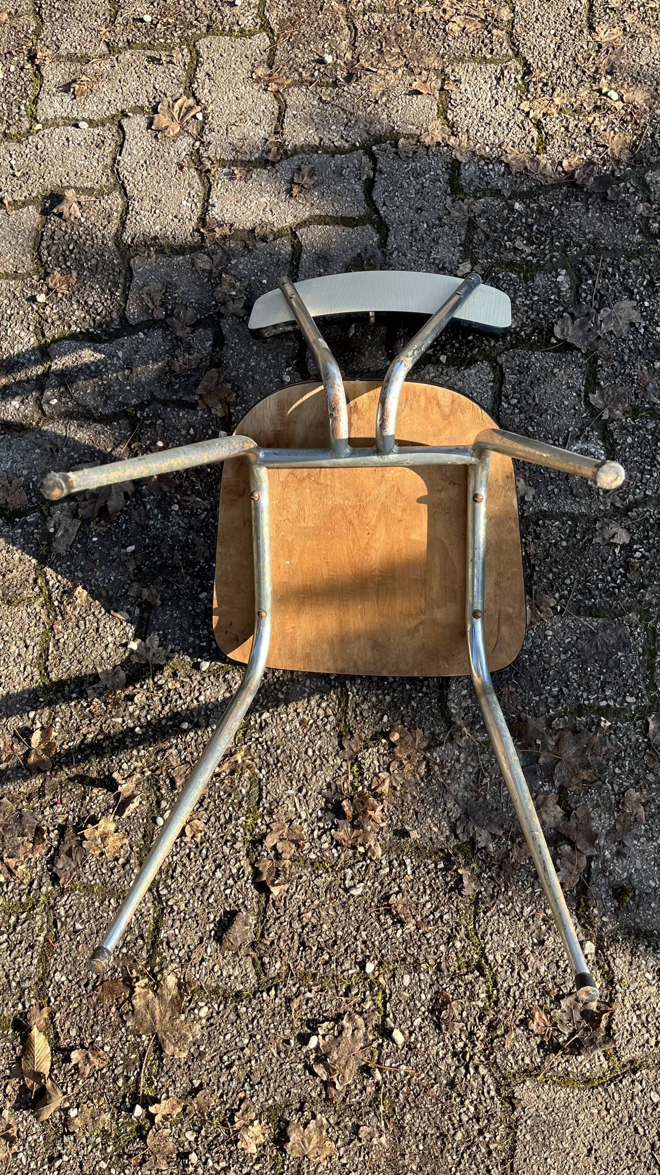 Red and cream Formica kitchen chairs