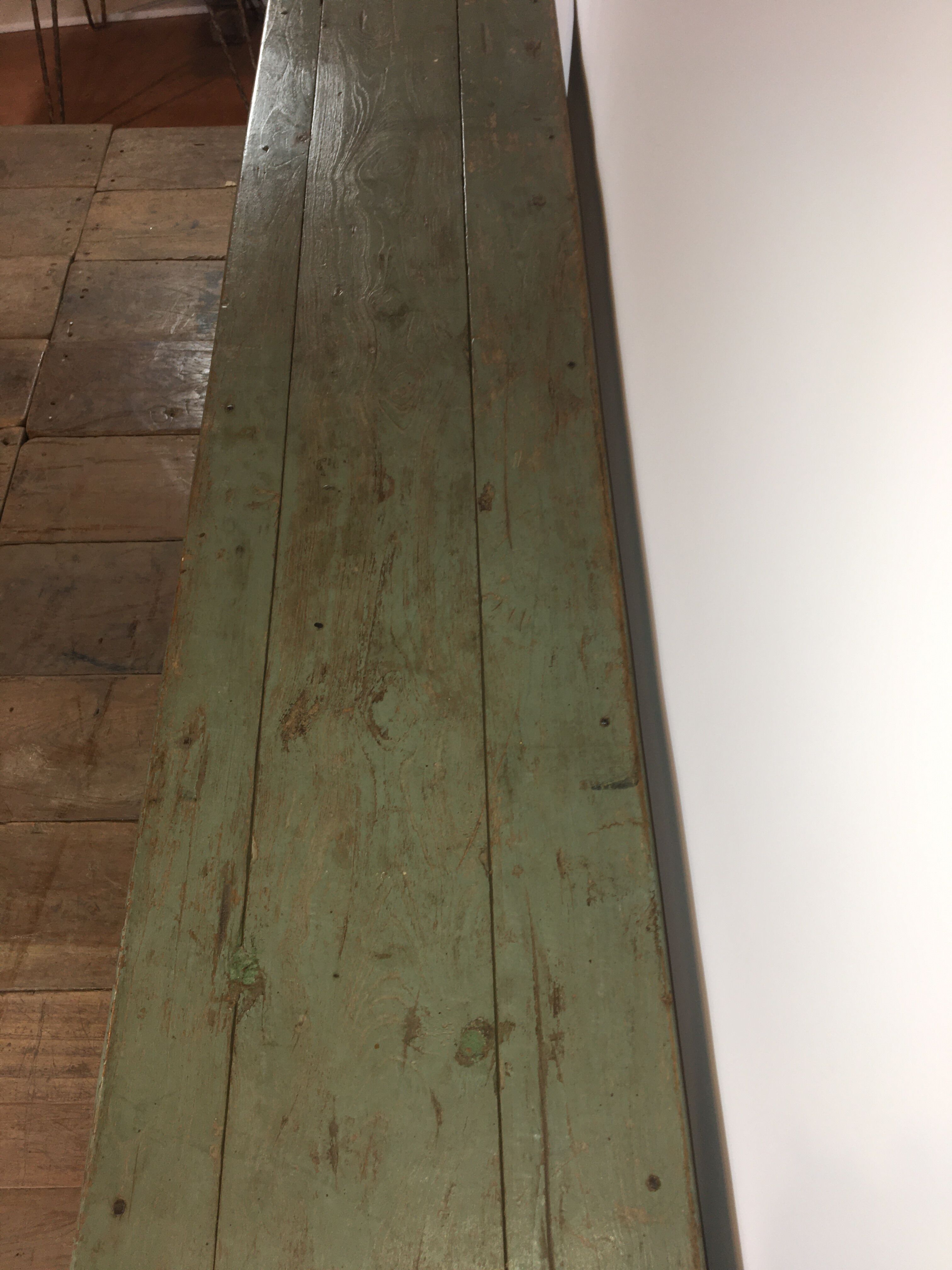 Grey lase wooden bench with inscriptions