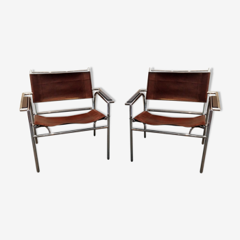 Paire de fauteuils métal chromé et cuir, années 60