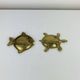 Pair of animal trinket trays in brass, fish and turtle.