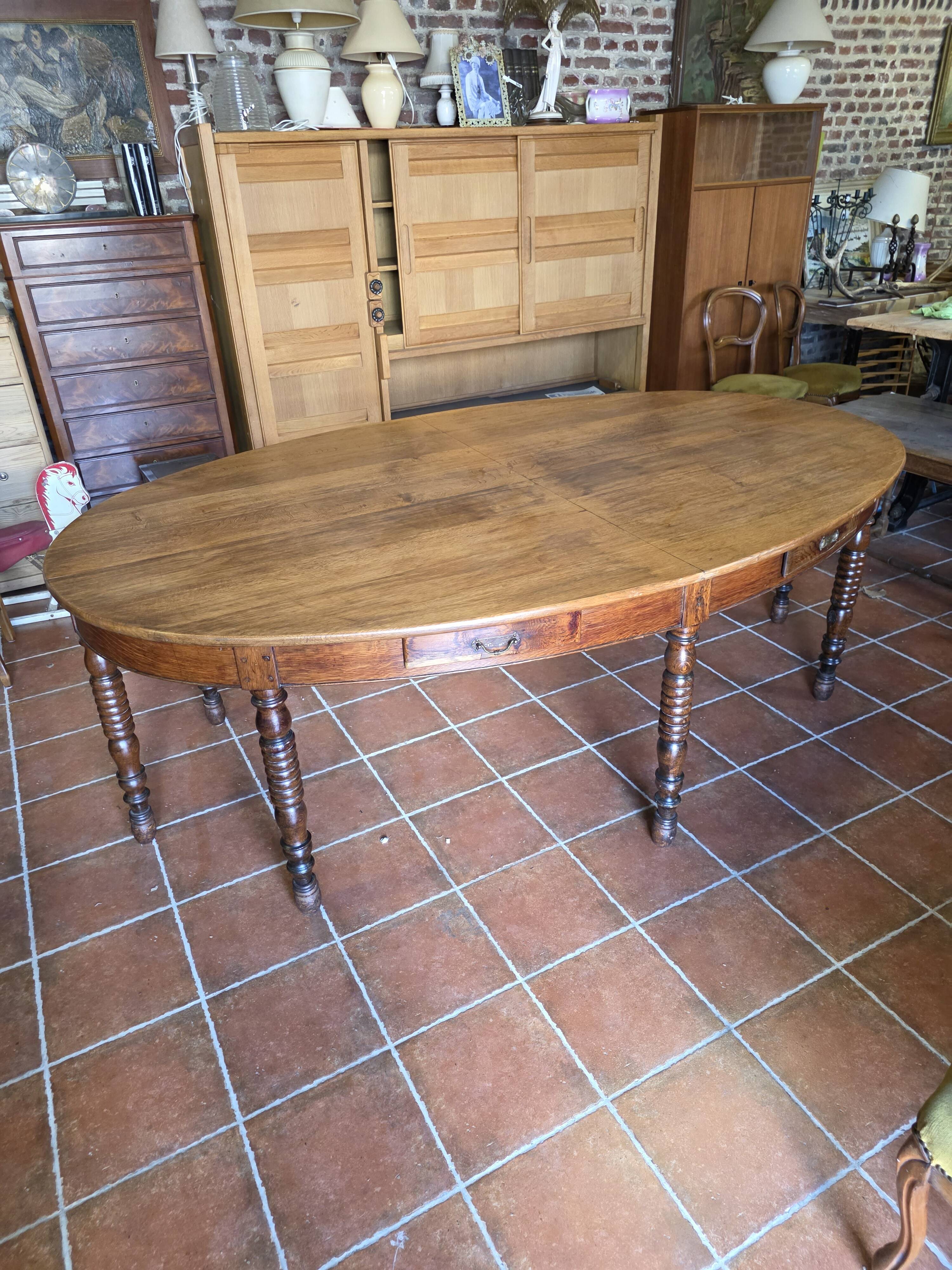 Large oval monastery table in solid oak, 19th century, 243×154cm