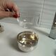 Vintage silver cup with a glass interior.