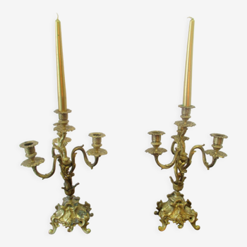 Pair of bronze candelabras and brass bobèches