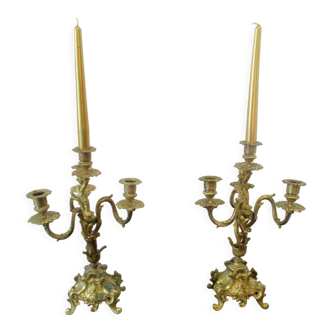 Pair of bronze candelabras and brass bobèches