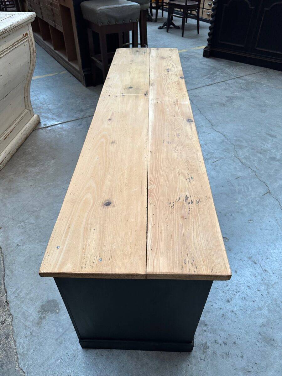 Old workshop furniture transformed into a TV unit.