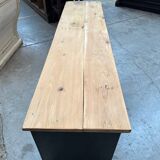 Old workshop furniture transformed into a TV unit.