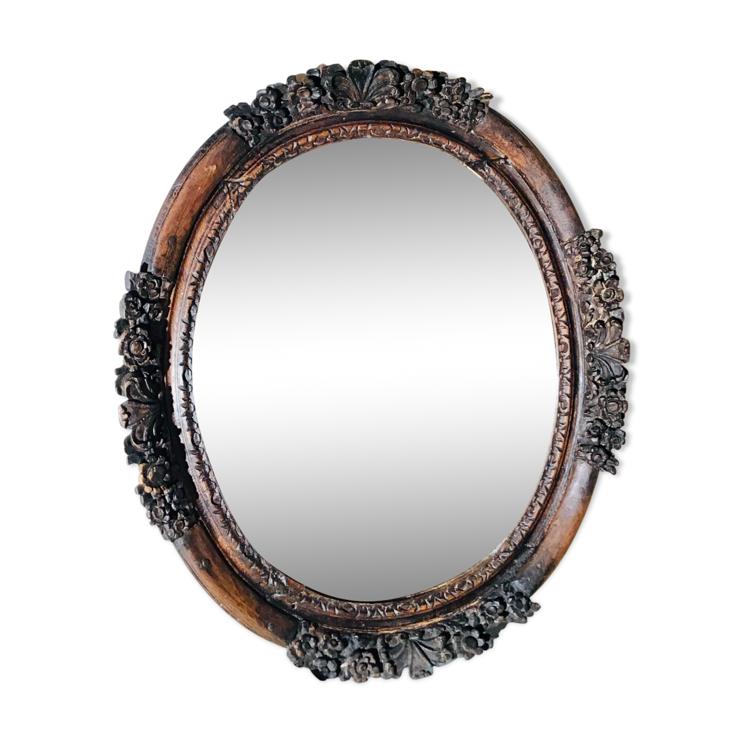 Oval mirror on an 18th century frame