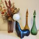 Lampe otarie noire irisée bleue en terre cuite
